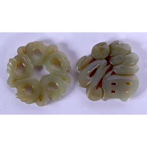 1718 - TWO EARLY 20TH CENTURY CHINESE CARVED JADE PLAQUES Late Qing. 5 cm diameter. (2)