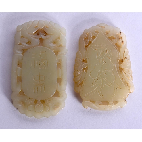 1723 - TWO EARLY 20TH CENTURY CHINESE CARVED JADE PLAQUES Late Qing. 5 cm diameter. (2)