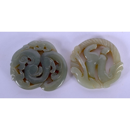 1726 - TWO EARLY 20TH CENTURY CHINESE CARVED JADE PLAQUES Late Qing. 5 cm diameter. (2)