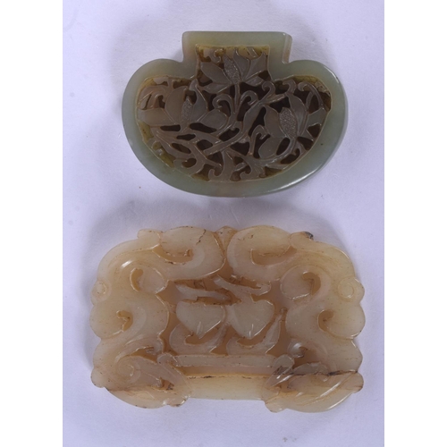 1727 - TWO EARLY 20TH CENTURY CHINESE CARVED JADE PLAQUES Late Qing. 5 cm diameter. (2)