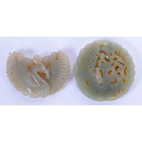 1729 - TWO EARLY 20TH CENTURY CHINESE CARVED JADE PLAQUES Late Qing. 5 cm diameter. (2)