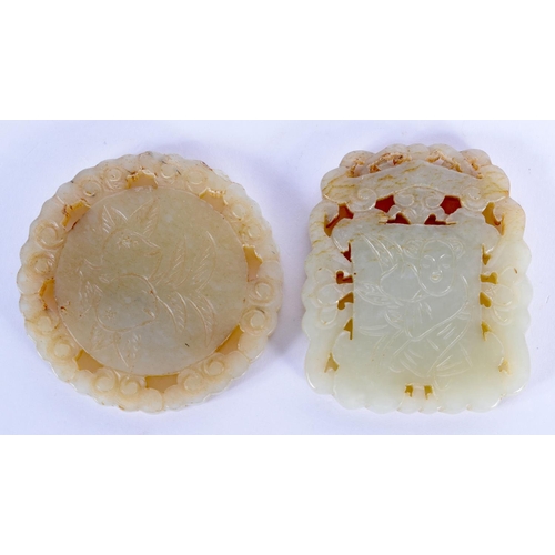 1732 - TWO EARLY 20TH CENTURY CHINESE CARVED JADE PLAQUES Late Qing. 5 cm diameter. (2)