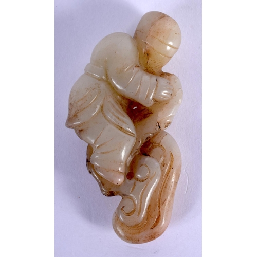 1738 - A 19TH CENTURY CHINESE CARVED JADE FIGURE OF A BOY Qing. 6 cm x 4 cm.