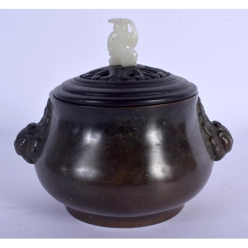 1740 - A 19TH CENTURY CHINESE BRONZE CENSER Qing, with jade and hardwood lid. 15 cm wide, internal width 9 ... 