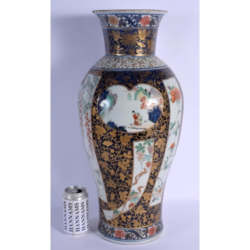 1742 - A RARE LARGE 18TH CENTURY JAPANESE EDO PERIOD IMARI BALUSTER VASE painted with buildings and landsca... 