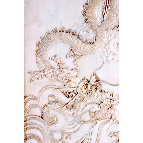 1758 - A LARGE 19TH CENTURY JAPANESE MEIJI PERIOD CARVED IVORY SCHOLARS SCREEN decorated with dragons among... 