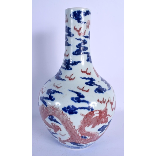 1760 - A 19TH CENTURY CHINESE BLUE AND WHITE IRON RED VASE Daoguang mark and probably of the period. 32 cm ... 