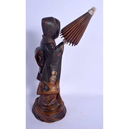 1761 - A 19TH CENTURY JAPANESE MEIJI PERIOD LACQUERED IVORY FIGURE OF A FEMALE modelled holding a parasol. ... 