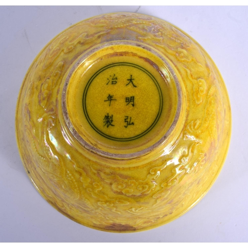 1774 - A CHINESE YELLOW GLAZED PORCELAIN DRAGON BOWL 20th Century. 14 cm diameter.