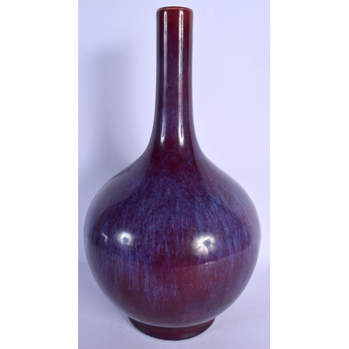 1781 - A CHINESE FLAMBE PORCELAIN VASE 20th Century, of bulbous form. 36 cm high.