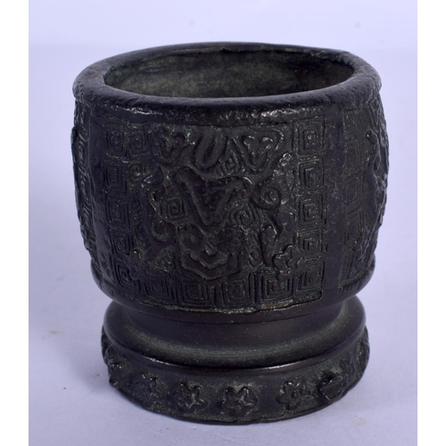 1798 - A CHINESE MING DYNASTY BRONZE CENSER together with a similar dish. Largest 6 cm x 4 cm. (2)