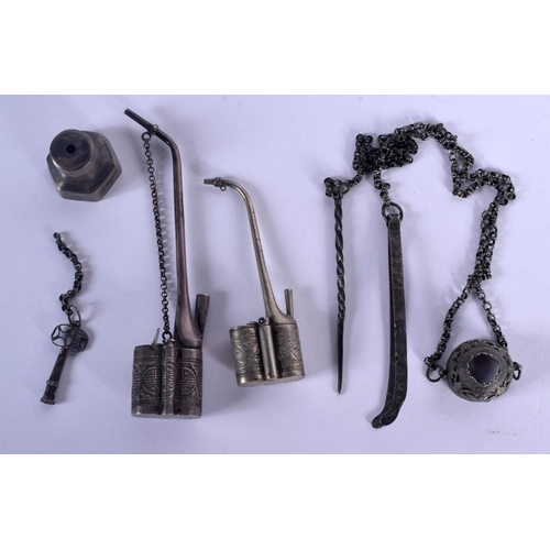 1799 - AN EARLY 20TH CENTURY CHINESE WHITE METAL OPIUM PIPE with tools. (4)