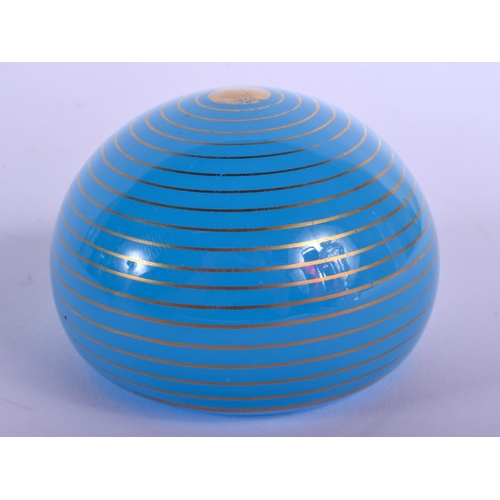 21 - AN UNUSUAL BACCARAT BLUE SWIRL GLASS PAPERWEIGHT. 5.5 cm wide.