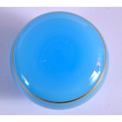 21 - AN UNUSUAL BACCARAT BLUE SWIRL GLASS PAPERWEIGHT. 5.5 cm wide.