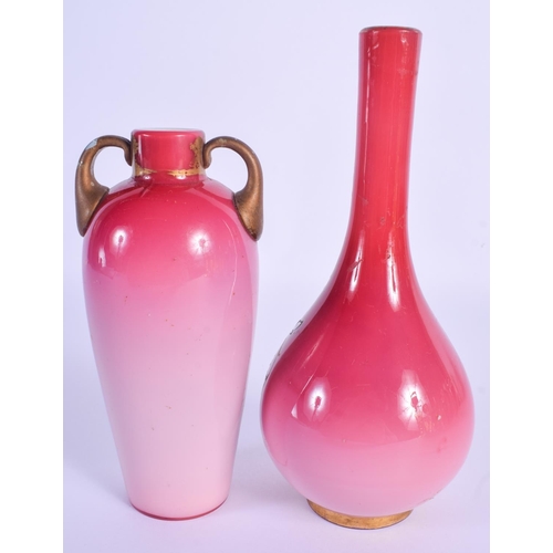 23 - TWO ANTIQUE PINK VASELINE GLASS VASES. Largest 19 cm high. (2)