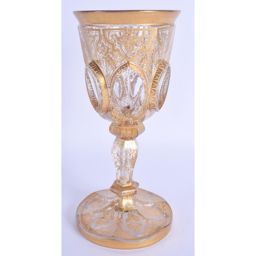 28 - A 19TH CENTURY BOHEMIAN GILT PAINTED GLASS BEAKER CUP painted with motifs. 19 cm high.