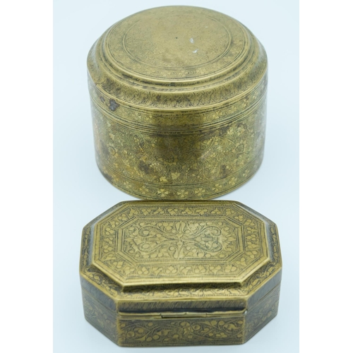 4008 - Two Indian 19th century engraved brass boxes largest 9.5cm x 13 cm. (2)