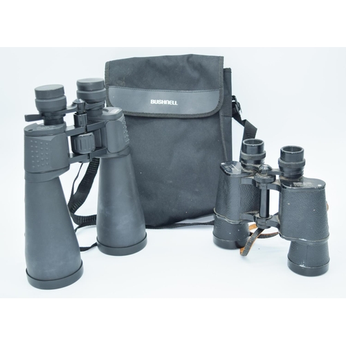 4018 - A pair of Bushnell binoculars together with Optomax binoculars . (2)