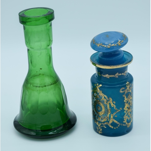 4023 - A Middle Eastern glass vase together with a   blue vase and a stopper 23cm . (3)