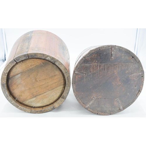 4080 - A 19th century metal banded oak barrel together with another largest 23 x 25.5cm.