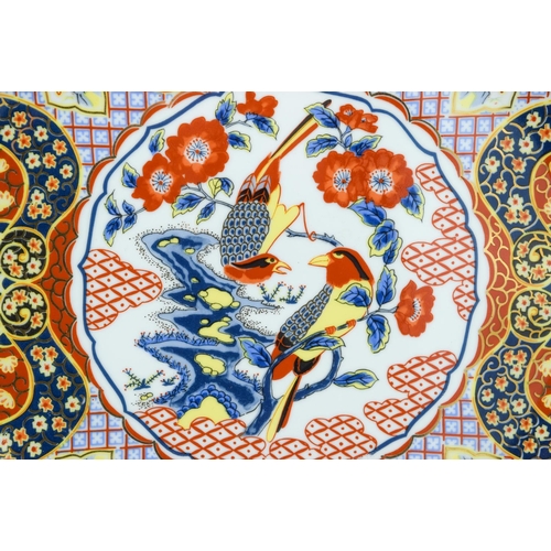 4131 - A large Japanese Imari platter depicting birds in a landscape 36 cm.