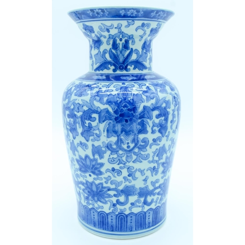 4160 - 20th Century Chinese Blue and white vase decorated with blue scrolling foliage 30cm.