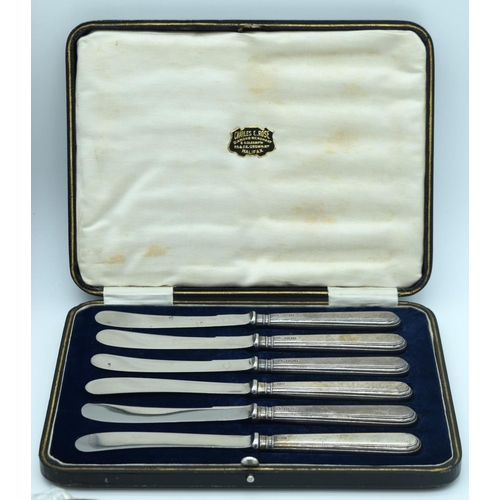 4169 - A set of six Silver handled fruit knives and a collection of plate