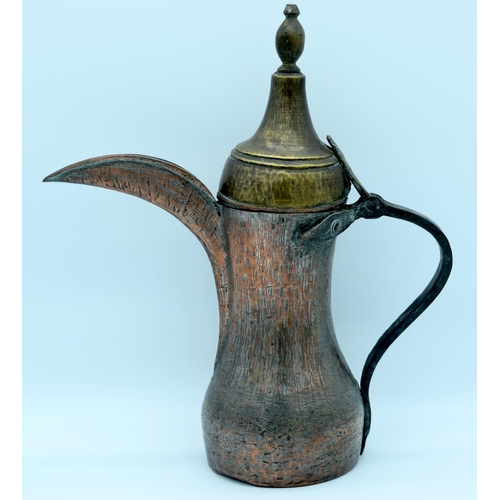 4173 - A Middle Eastern 19th Century copper ewer 43 cm.