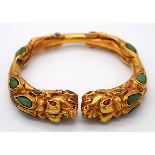 4207 - A Chinese yellow metal dragon bracelet inlaid with turquoise stones 7.5 x 6.5cm