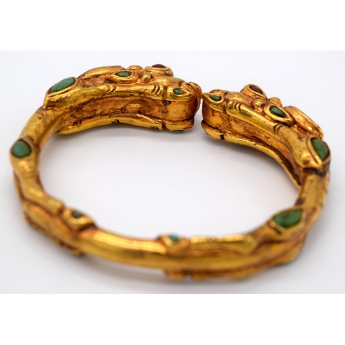 4207 - A Chinese yellow metal dragon bracelet inlaid with turquoise stones 7.5 x 6.5cm