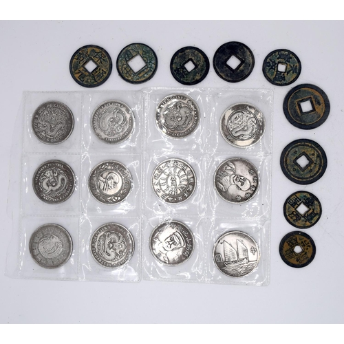 4213 - A group of Chinese white metal coins and tokens (21).