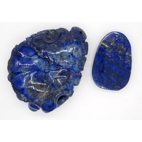 4216 - A carved Lapis Lazuli bolder in the form of a rat and a small pendant 8 x 6.5 cm.