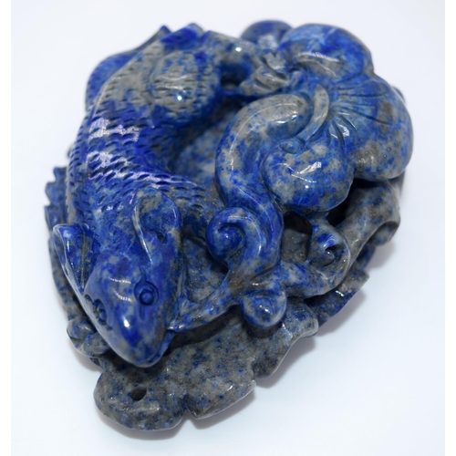 4216 - A carved Lapis Lazuli bolder in the form of a rat and a small pendant 8 x 6.5 cm.