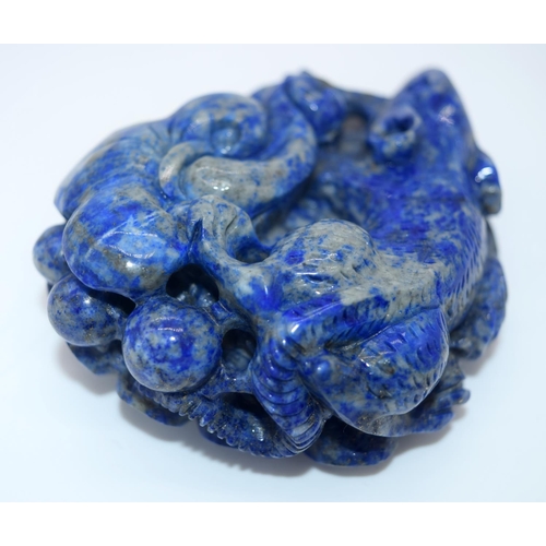 4216 - A carved Lapis Lazuli bolder in the form of a rat and a small pendant 8 x 6.5 cm.