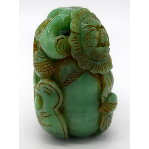 4218 - A carved jade bolder decorated with foliage 7 x 7 cm.