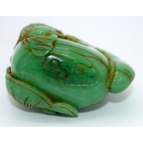 4218 - A carved jade bolder decorated with foliage 7 x 7 cm.