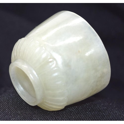 4219 - A carved jade cup 4 x 3 cm.