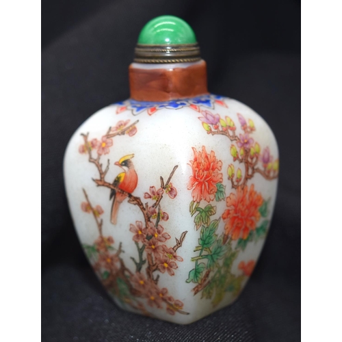 4223 - A Chinese glass snuff bottle decorated with birds and foliage, 7 cm .