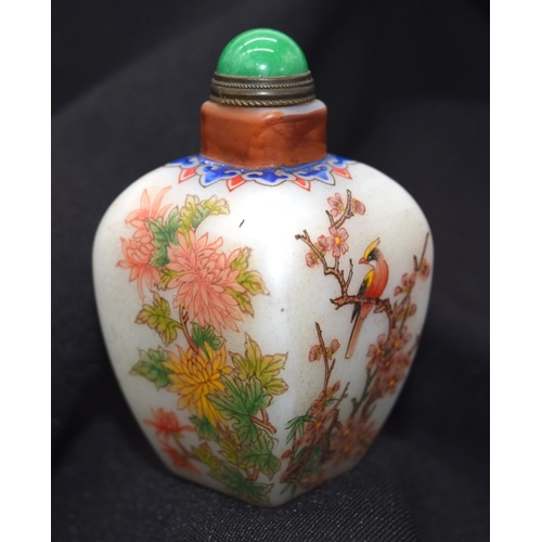 4223 - A Chinese glass snuff bottle decorated with birds and foliage, 7 cm .