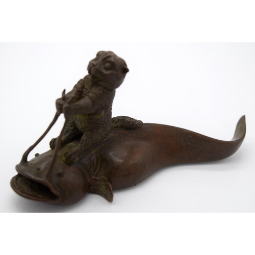 4231 - A Japanese small bronze Catfish being ridden by a beaver  12cm.