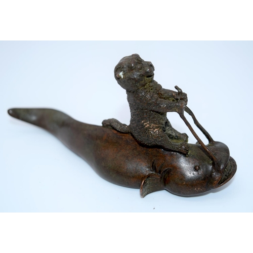 4231 - A Japanese small bronze Catfish being ridden by a beaver  12cm.