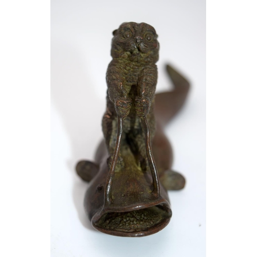 4231 - A Japanese small bronze Catfish being ridden by a beaver  12cm.