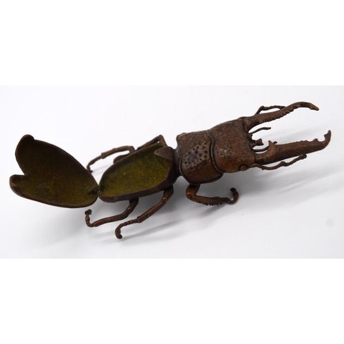 4232 - A Japanese small bronze stag beetle 13 cm .