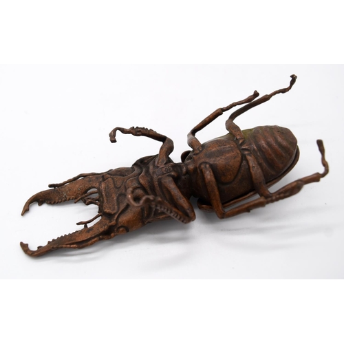 4232 - A Japanese small bronze stag beetle 13 cm .