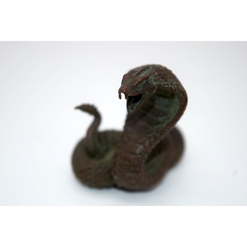 4234 - A Japanese small bronze Cobra  4cm.