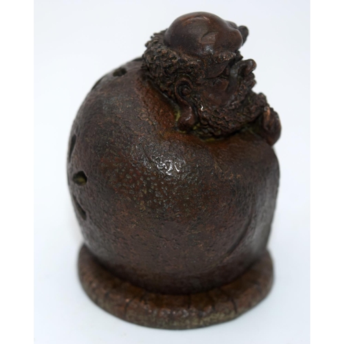 4240 - A Japanese small bronze figure of a male   12cm.