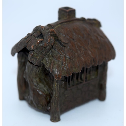 4241 - A Japanese small bronze figure of a house 6 x 5 cm (2).