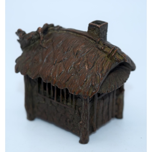 4241 - A Japanese small bronze figure of a house 6 x 5 cm (2).