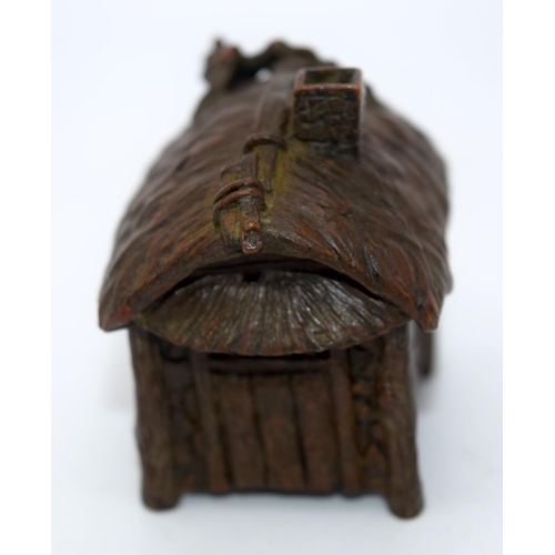 4241 - A Japanese small bronze figure of a house 6 x 5 cm (2).