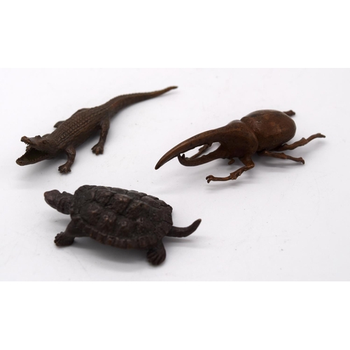 4243 - A Japanese small bronze turtle, together with a crocodile and a beetle largest  9cm (3)